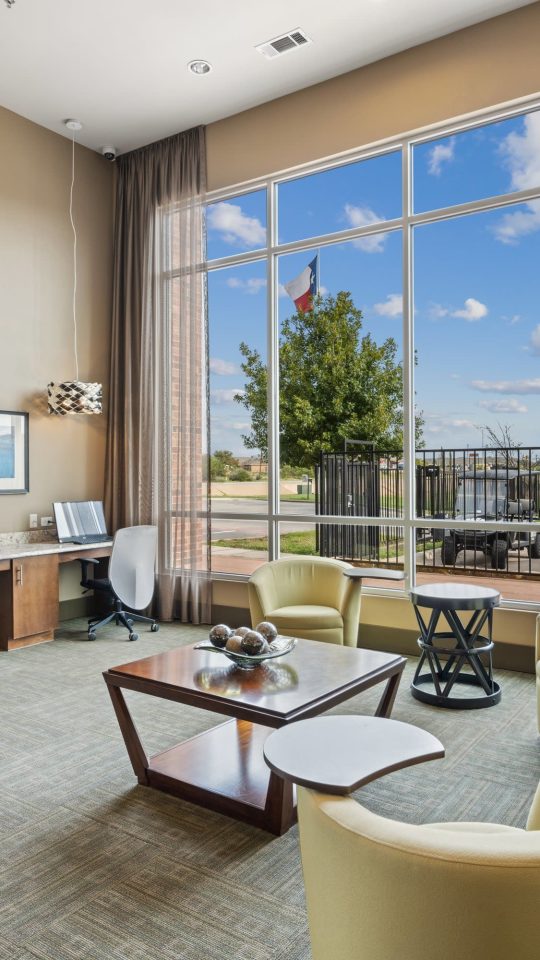 the lobby of a hotel with a large window at The  BLVD